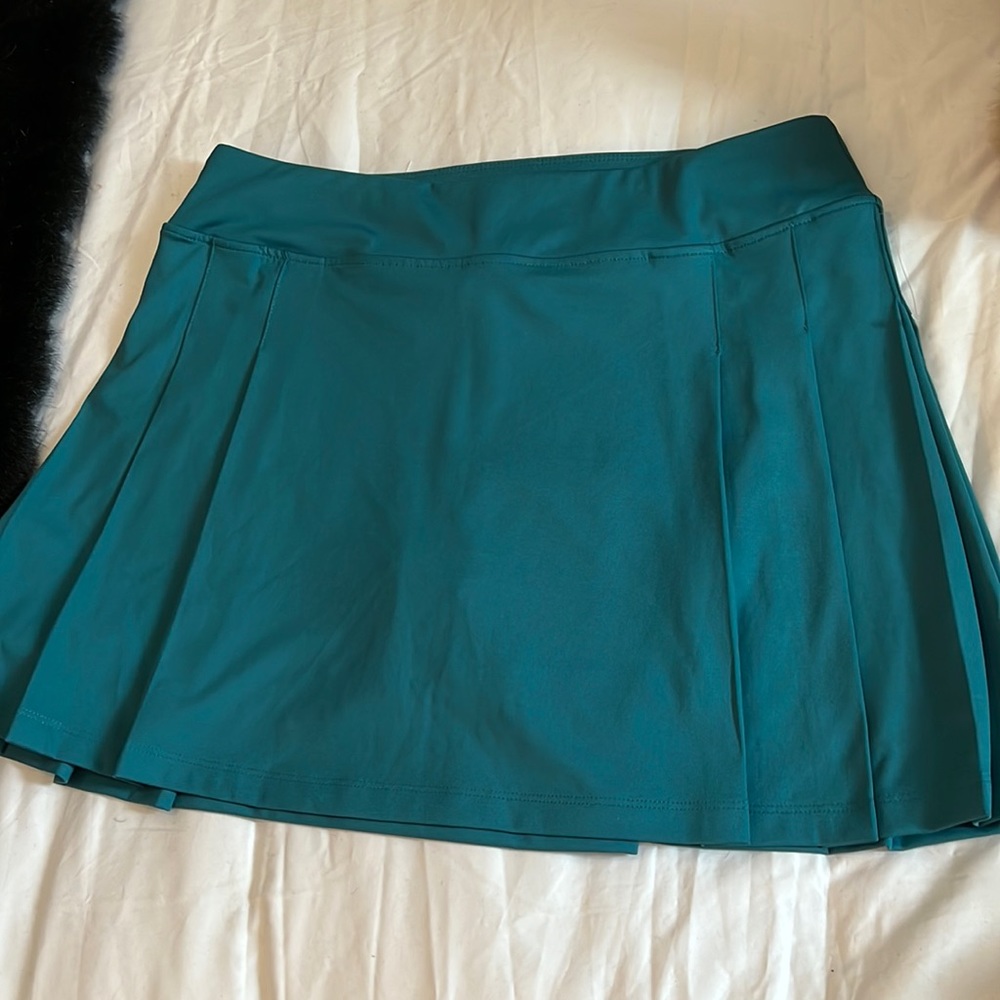The game will be fantastic in a Tommy Bahama golf skirt.